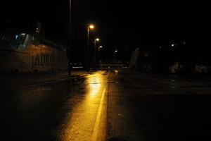 artificial lighting, city, Croatia, eye level view, ferry, night, spring, street, street light, wet, Zadar, Zadarska