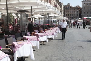 chair, crowd, day, eye level view, furniture, Italia , Lazio, people, restaurant, Rome, street, summer, sunny, table, umbrella, waiter, walking