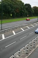 car, day, elevated, England, grass, guardrail, London, natural light, road, The United Kingdom, vegetation