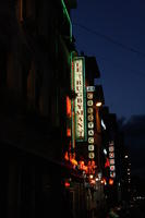 advertisement, artificial lighting, Belgium, below, Brussels, building, evening, fluorescent, retail, sign, summer