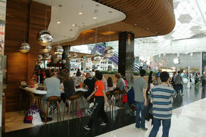 cafe, day, eating, England, eye level view, group, indoor lighting, interior, London, mall, natural light, people, shopping centre, sitting, The United Kingdom