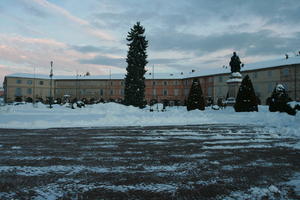 ambient light, day, dusk, eye level view, Italia , Mondovi, overcast, pavement, Piemonte, pine, snow, street, winter