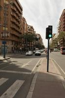 Alicante, building, car, day, eye level view, natural light, residential, Spain, street, sunny, traffic light, Valenciana