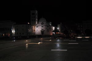 artificial lighting, building, church, city, Croatia, eye level view, night, pavement, pavement, paving, plaza, spring, wet, Zadar, Zadarska