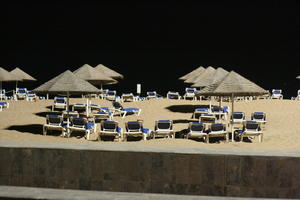 Agadir, artificial lighting, autumn, beach, evening, eye level view, Morocco, parasol, sunbed, sunlight, sunny, sunshine