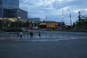 artificial lighting, Bilbao, building, child, evening, eye level view, group, Pais Vasco, pavement, Spain, square