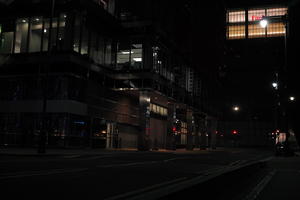 artificial lighting, building, city, cityscape, England, eye level view, London, night, pavement, sidewalk, street, The United Kingdom, winter