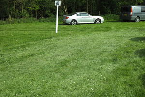 car, day, England, eye level view, grass, natural light, parking, sign, The United Kingdom, Woking