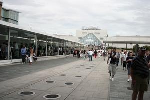 building, casual, day, England, exhibition, eye level view, floor, group, London, pavement, people, summer, The United Kingdom, walking