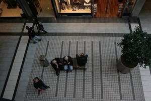 above, artificial lighting, elderly, floor, group, indoor lighting, Lubuskie, people, Poland, potted plant, retail, shop, shopfronts, shopping centre, sitting, Zielona Góra