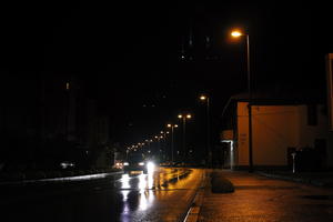 artificial lighting, car, car lights, city, Croatia, eye level view, night, spring, street, street light, urban, walkway, wet, Zadar, Zadarska