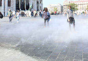 Budapest, day, eye level view, group, Hungary, pavement, people, smoke, square, standing, summer, sunny, walking