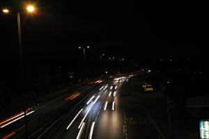 artificial lighting, car, car lights, city lights, elevated, England, evening, London, night, outdoor lighting, road, The United Kingdom, traffic, urban, winter