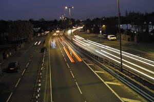 artificial lighting, car, car lights, city lights, elevated, England, evening, lamppost, London, night, outdoor lighting, road, The United Kingdom, traffic, urban, winter