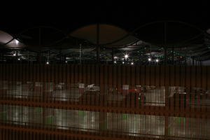 airport, artificial lighting, elevated, eye level view, louvres, Madrid, night, parking, Spain