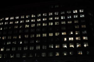 artificial lighting, building, building, England, eye level view, London, looking up, night, office, The United Kingdom, winter