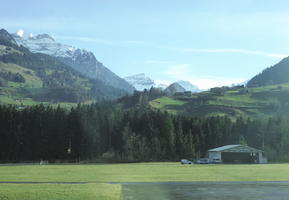 bright, cliffs, day, eye level view, forest, hangar, mountain, nature, open space, outdoors, rocks, sunlight, sunny, Switzerland, Valais, winter