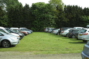 car, day, England, eye level view, grass, natural light, parking, The United Kingdom, Woking