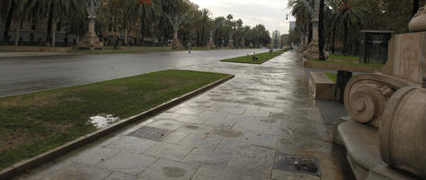 autumn, Barcelona, Cataluña, day, diffuse, diffused light, eye level view, grass, pavement, Spain, street, wet