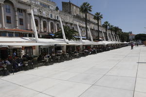 cafe, canopy, casual, Croatia, day, eye level view, furniture, pavement, people, plaza, sitting, Split, Splitsko-Dalmatinska, square, summer, summer, sunny