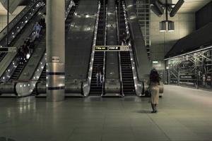 artificial lighting, England, escalator, eye level view, London, night, station, The United Kingdom