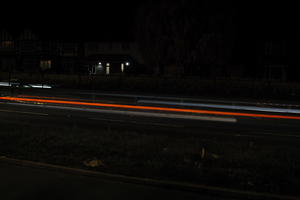 artificial lighting, car lights, city lights, England, evening, eye level view, London, night, outdoor lighting, road, The United Kingdom, urban, winter