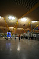 airport, artificial lighting, Barajas Airport, beam, building, ceiling, display, eye level view, floor, Madrid, natural light, sign, Spain