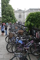 afternoon, bicycle, Cambridge, couple, day, England, eye level view, group, overcast, people, spring, street, The United Kingdom, transport