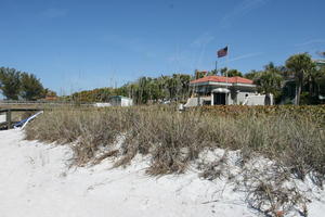 beach, bush, day, eye level view, flag, Florida, footbridge, Sarasota, sunny, sunshine, The United States, vegetation, villa, winter