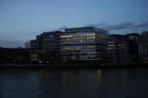 ambient light, building, city, cityscape, dusk, England, evening, eye level view, London, river, riverbank, The United Kingdom, waterfront, winter