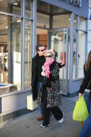 afternoon, casual, couple, day, England, eye level view, London, natural light, people, street, The United Kingdom, walking, winter, winter, woman