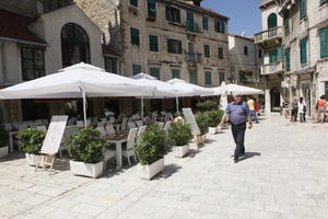 cafe, casual, Croatia, day, eye level view, furniture, parasol, pavement, people, plaza, potted plant, Split, Splitsko-Dalmatinska, square, summer, summer, sunny, walking