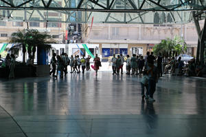 Australia, day, eye level view, floor, group, indoor lighting, interior, Melbourne, natural light, people, standing, station, Victoria, walking