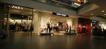 artificial lighting, Dolnoslaskie, eye level view, floor, indoor lighting, Poland, shopfronts, shopping centre, Wroclaw