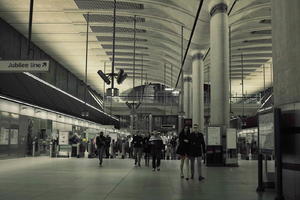 artificial lighting, England, eye level view, group, London, night, people, station, The United Kingdom, walking