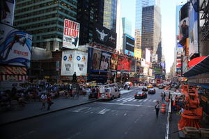 advertisement, building, car, day, elevated, man, Manhattan, New York, people, sign, sitting, street, summer, sunny, The United States, Times Square, walking, woman