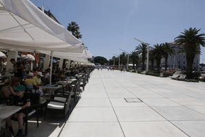 cafe, casual, Croatia, day, eye level view, furniture, lamppost, parasol, pavement, people, plaza, sitting, Split, Splitsko-Dalmatinska, square, summer, summer, sunny