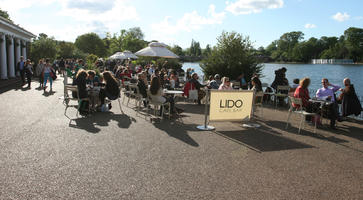 cafe, casual, chair, crowd, day, England, eye level view, furniture, London, park, people, sitting, summer, sunny, The United Kingdom, umbrella