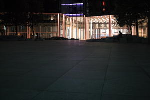 artificial lighting, building, England, eye level view, lobby, London, night, pavement, plaza, spring, The United Kingdom, urban