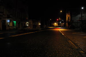 artificial lighting, city lights, eye level view, Kalisz, night, outdoor lighting, Poland, street, urban, wet, Wielkopolskie, winter