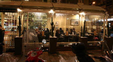 artificial lighting, Bari, canopy, eye level view, group, Italia , night, people, potted plant, Puglia, restaurant, sitting, winter