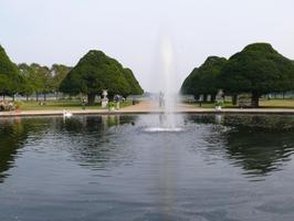 afternoon, day, England, eye level view, fountain, natural light, park, pond, summer, sunny, The United Kingdom, tree