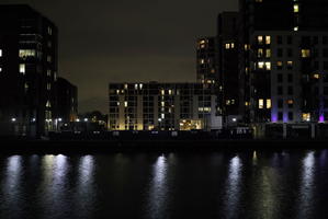 artificial lighting, building, cityscape, England, eye level view, London, night, reflected, river, The United Kingdom