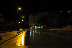 artificial lighting, city, Croatia, eye level view, night, spring, street, street light, urban, walkway, wet, Zadar, Zadarska