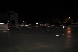 artificial lighting, building, city, Croatia, eye level view, night, pavement, pavement, paving, plaza, spring, wet, Zadar, Zadarska