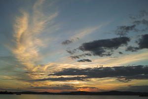 backlight, cloud, cloudy, Cumulus, day, dusk, eye level view, natural light, open space, sky, sunset, sunset