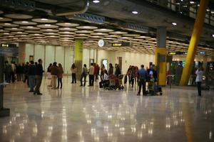 artificial lighting, Barajas Airport, ceiling, crowd, eye level view, floor, Madrid, people, Spain, station