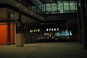 artificial lighting, building, England, eye level view, London, night, office, pavement, restaurant, sculpture, spring, The United Kingdom, urban, walkway