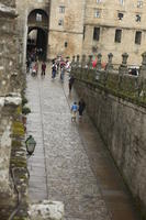 day, elevated, Galicia, group, overcast, pavement, people, Santiago de Compostela, Spain, street, wall