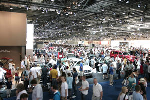 artificial lighting, ceiling, crowd, elevated, England, exhibition, interior, London, people, The United Kingdom